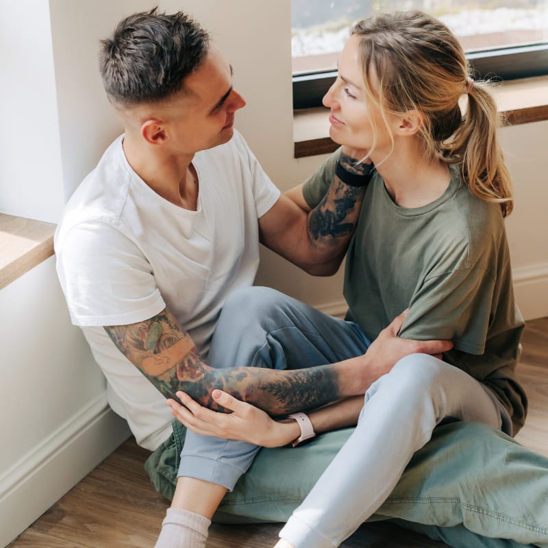 Couple discussing boundaries before chastity play